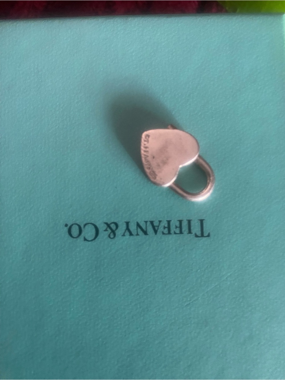 Tiffany & Co. Sterling Silver Heart Padlock Charm on Blue - Picture 2 of 2